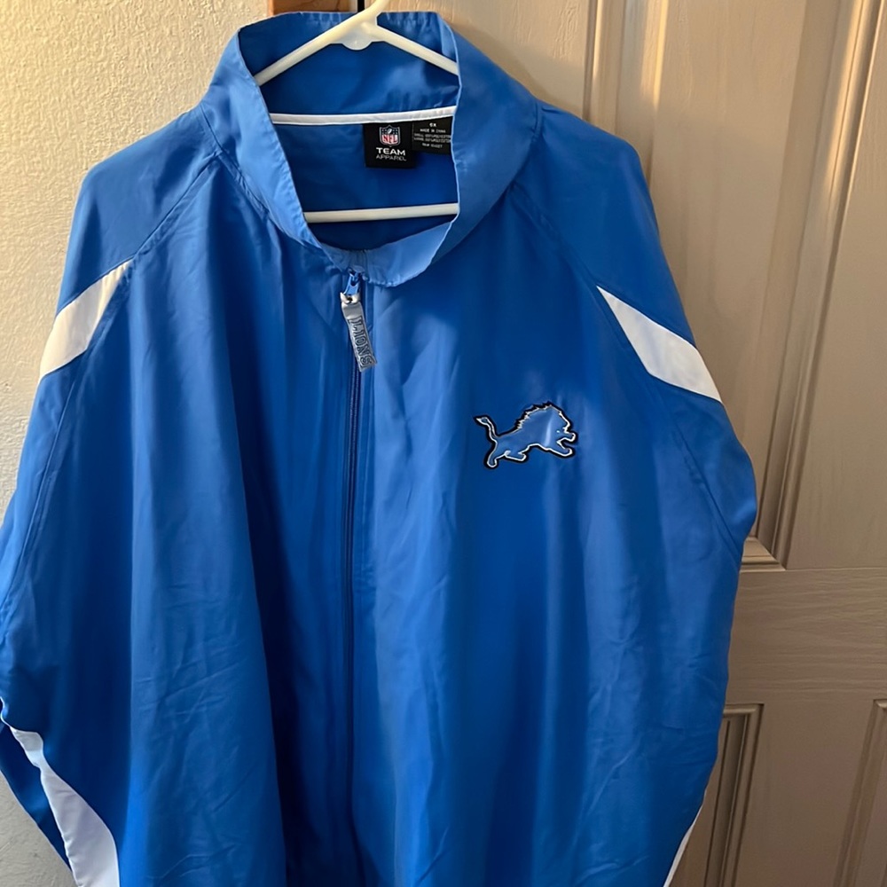 NFL team apparel size 6X light blue and white light jacket